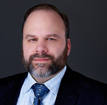 Scott Poerschke Headshot.jpeg