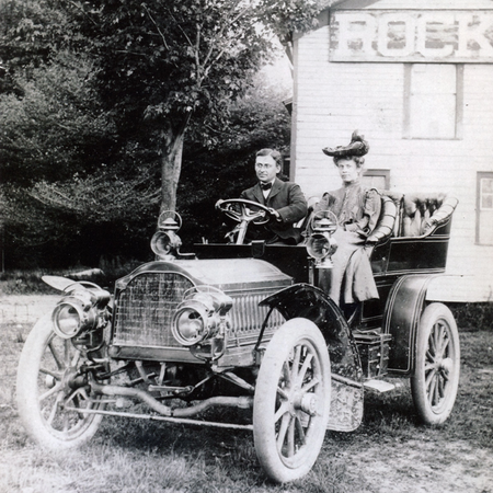 Mr. Packard and woman in Packard car