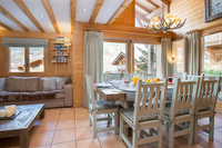 The chalet enjoys incredible views and a cozy atmosphere_