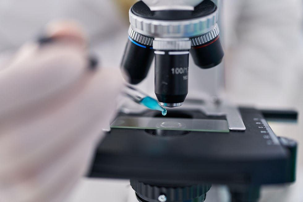 young-hispanic-man-wearing-scientist-uniform-using-microscope-laboratory.jpg