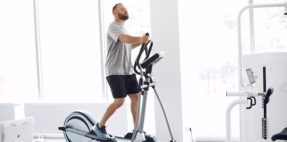 bearded-man-using-spin-bike-physiotherapy-room.jpg