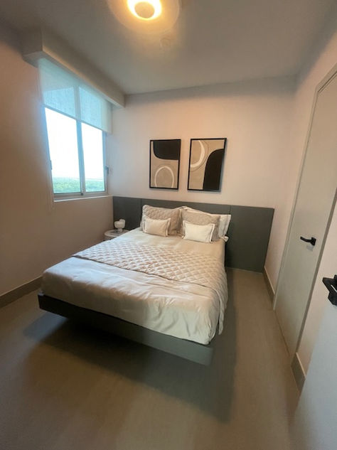 Photos of a modern 3-bedroom ocean-view apartment in Panama City, featuring spacious interiors, elegant finishes, private balcony, and premium amenities – listed by Ama Panama Realty.