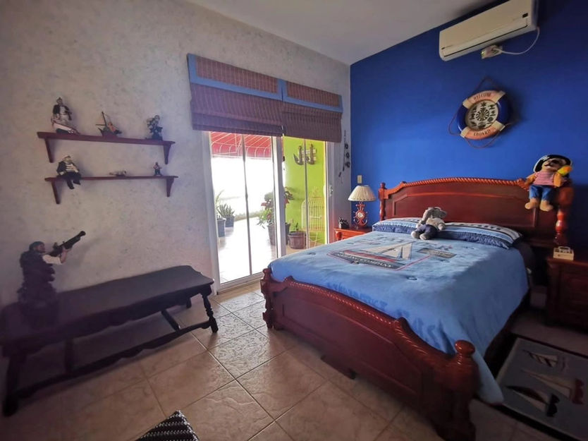 "Beachfront 5-bedroom apartment for sale or rent in Nueva Gorgona, Panama – fully furnished, ocean views, direct beach access, private low-rise building with pool and social area." Ama Panama Realty