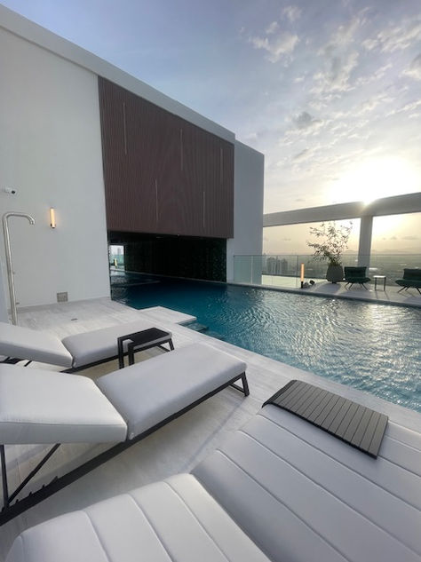 Photos of a modern 3-bedroom ocean-view apartment in Panama City, featuring spacious interiors, elegant finishes, private balcony, and premium amenities – listed by Ama Panama Realty.