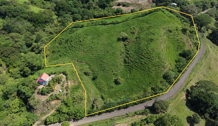 Drone view showing terrain and layout of hilltop property near Cambutal