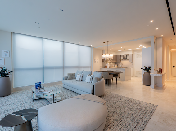 “Elegant oceanfront living room with floor-to-ceiling windows – The Palms Beach Resort Panama”