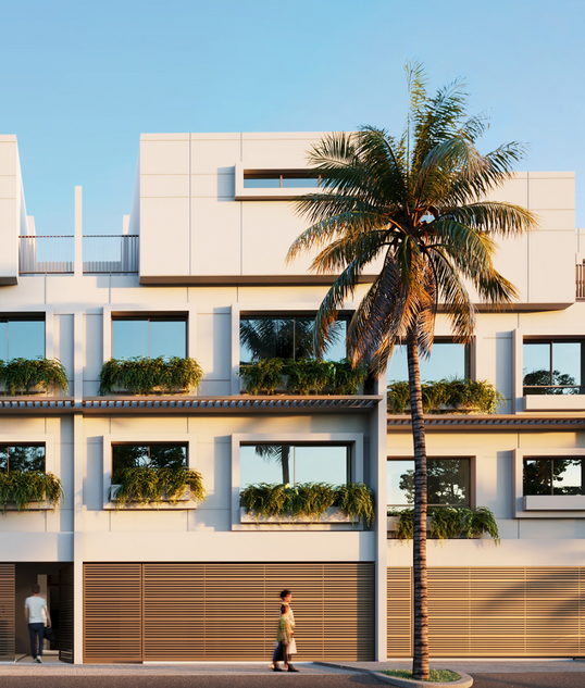 Street view rendering of contemporary townhouses at Ocean Reef Park with private garages and tropical landscaping