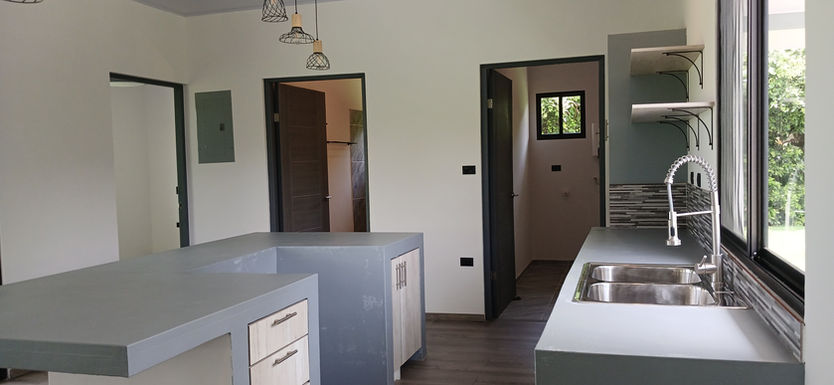 Bright contemporary kitchen in 2-bedroom Equus Village house near Pedasí.