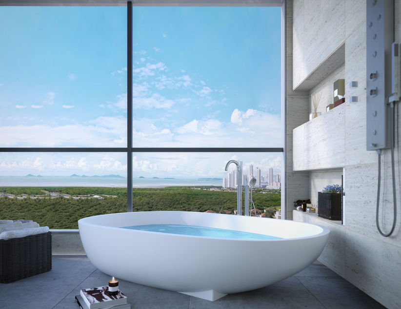 Luxury bathtub beside panoramic windows at Oceana Santa María
