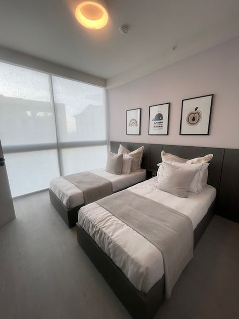 Photos of a modern 3-bedroom ocean-view apartment in Panama City, featuring spacious interiors, elegant finishes, private balcony, and premium amenities – listed by Ama Panama Realty.