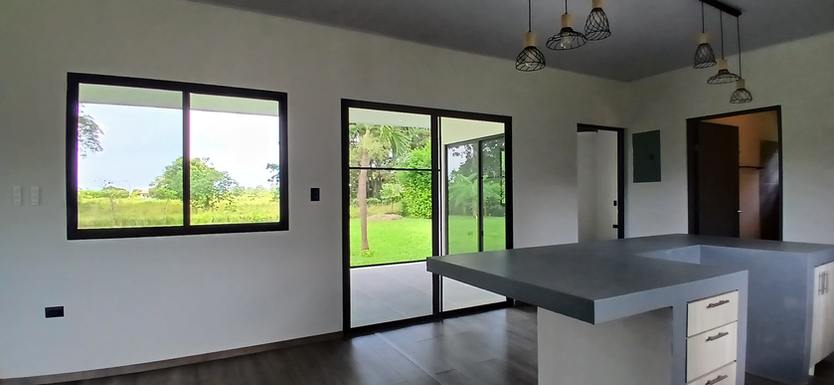 Bright contemporary kitchen in 2-bedroom Equus Village house near Pedasí.