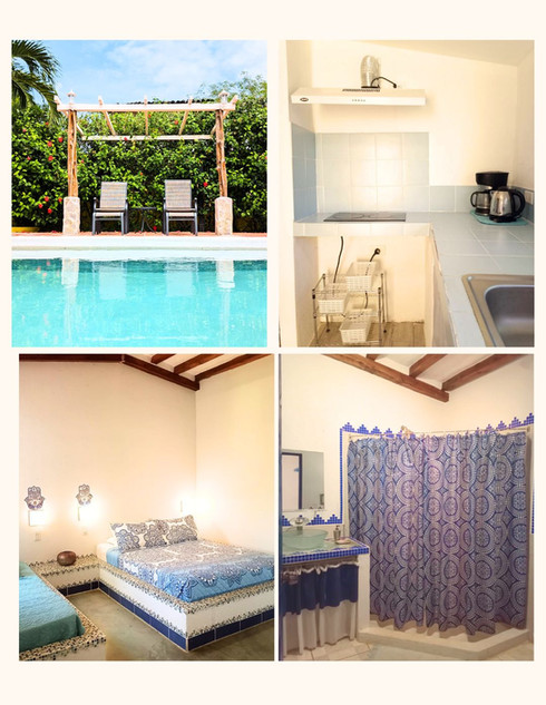 Comfortable studio-style rental unit with bed and sitting area at Villa del Sol income property