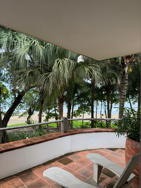 “Private wrap-around veranda with ocean views at Los Destiladeros studio apartment.”
