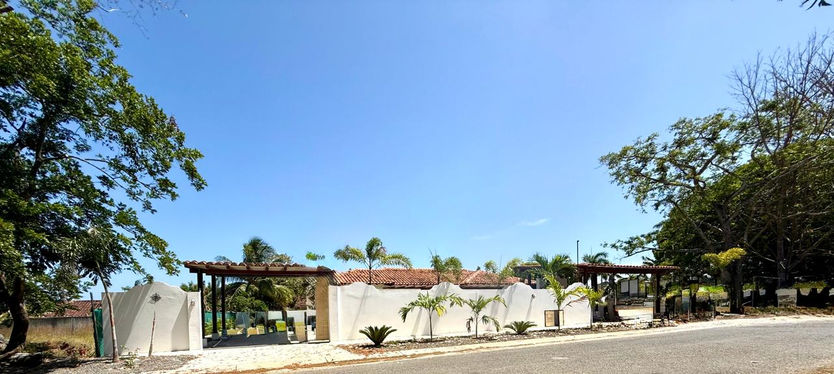 Quiet residential street in front of Casa Haizea, showing the calm neighborhood setting
