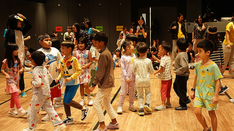 The children had fun playing games at the party in their PJs.