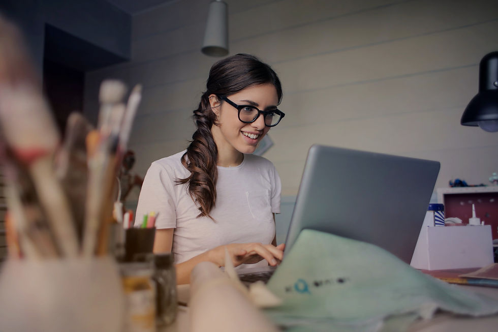 Young woman learning German and Greek online