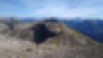 Looking back across a rolling mountain ridge