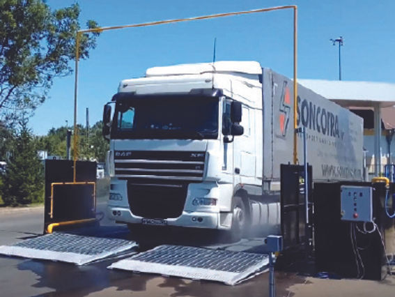 Automatic farm vehicle biosecurity disinfection system