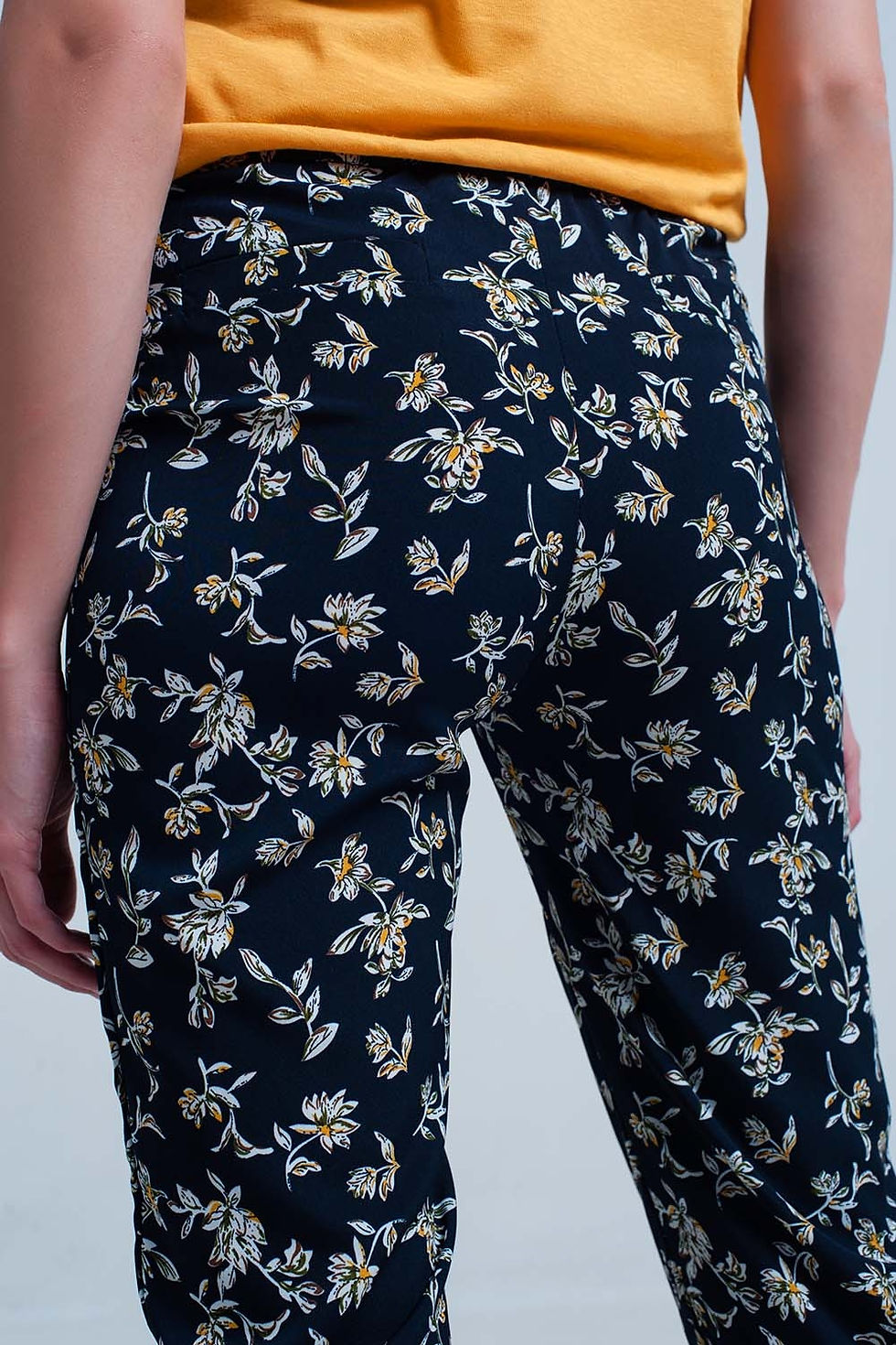 Thumbnail: Navy Floral Pants With a Belt
