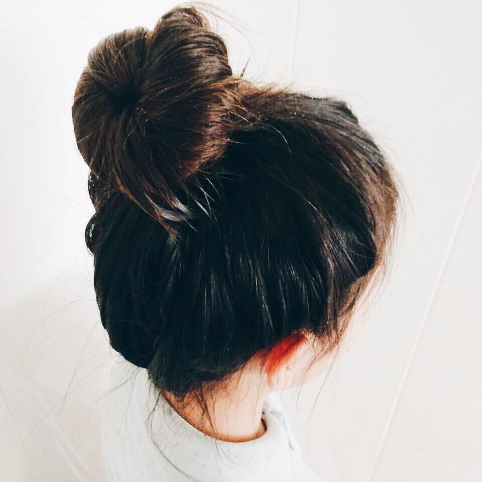 Tie your hair into a bun.