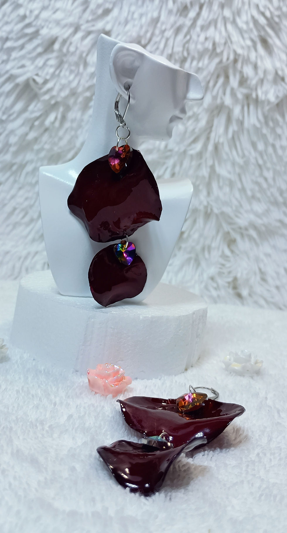 Thumbnail: Close-up of preserved red rose petals in resin with sparkling heart-shaped crystals, unique Danay Bloom jewelry.