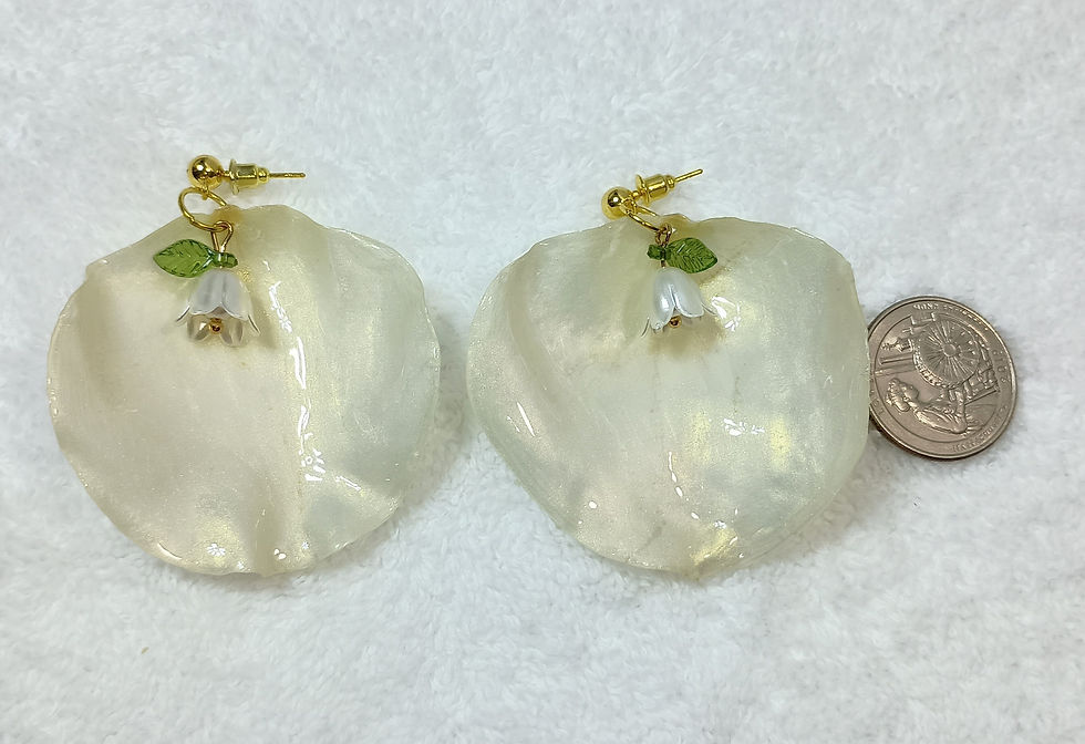 Thumbnail: Handcrafted botanical statement earrings with real rose petals in resin, artisan jewelry made in Miami by Danay Bloom