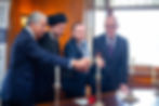 The First Minister of Scotland, Dr. Razawi, the Secretary of State for His Majesty's government, and the Jeweler to the late Queen, participate in an interfaith candle lighting ceremony.