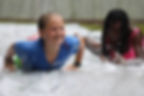 waukeela campers doing slip and slide.jpg