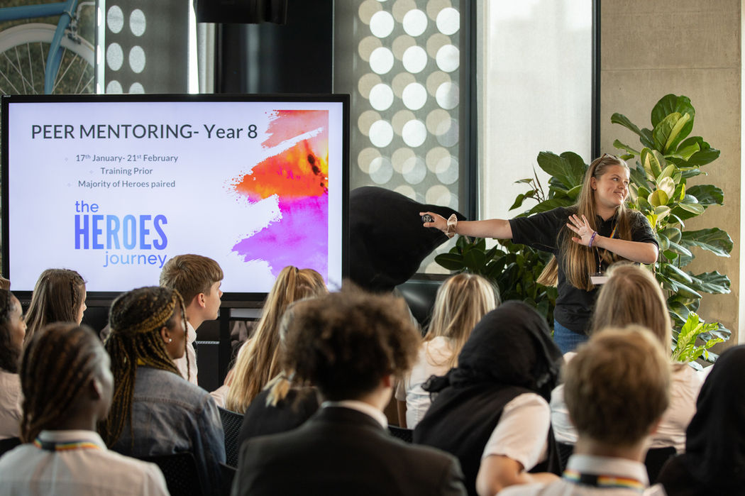 humanutopia facilitator speaking to students and business mentors at capital one corporate social responsibility student programme