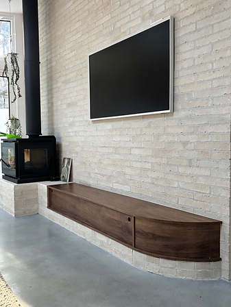 Built in curved TV unit made from Spotted Gum.