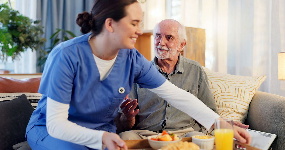 A guest at a Respite Stay receives a nutritious meal from one of the staff members.