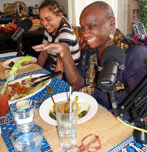 Colourful table runner and napkins on the table setting of Stirring It Up podcast with Andi Oliver and Miquita Oliver