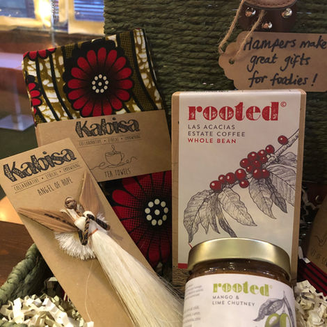 Kabisa napkins and Angel of Hope in a food hamper with Rooted Cafe delicatessen products