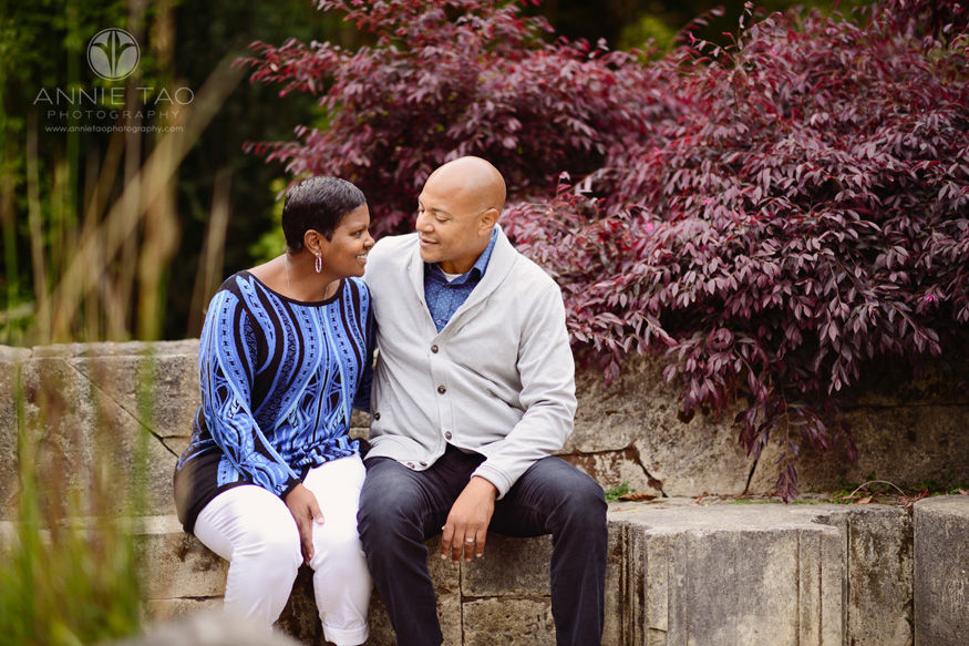 san-francisco-lifestyle-photography-couple-sitting-on-rock-looking-at-each-other