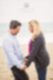 San-Francisco-engagement-photography-couple-facing-each-other-on-beach