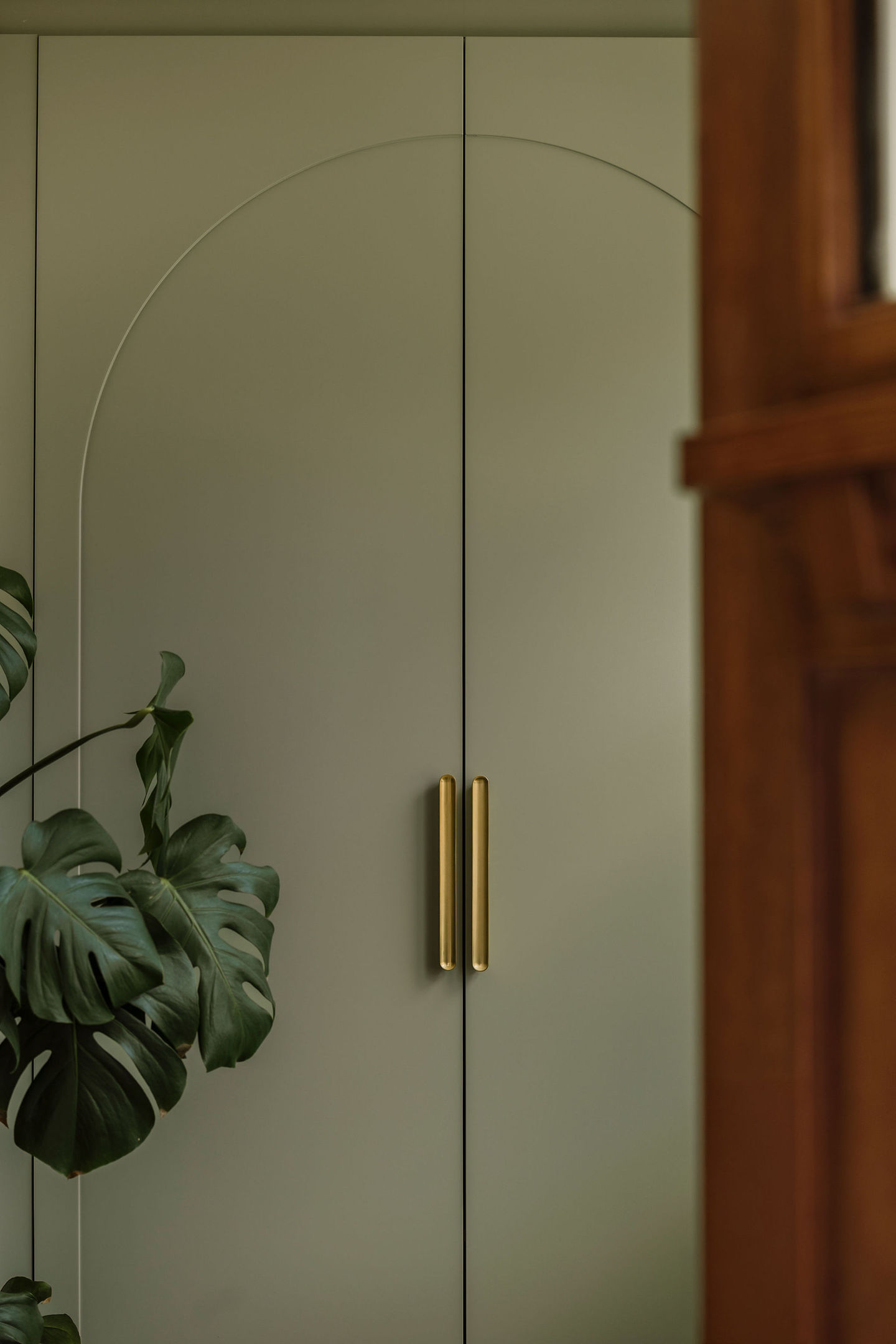 Arch mudroom cabinet - sage green