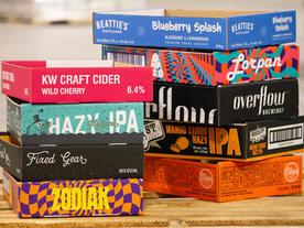 Stacks of digital and flexo printed trays.