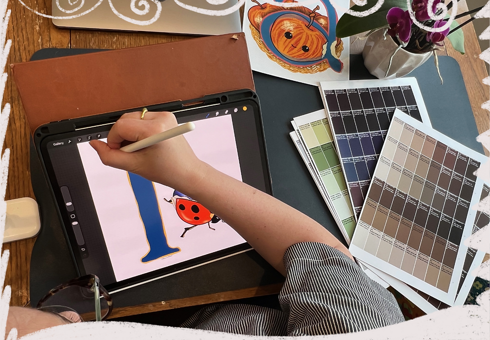 A photo of a person at a table with a tablet, colour swatches, and prints with a graphic frame around the photo