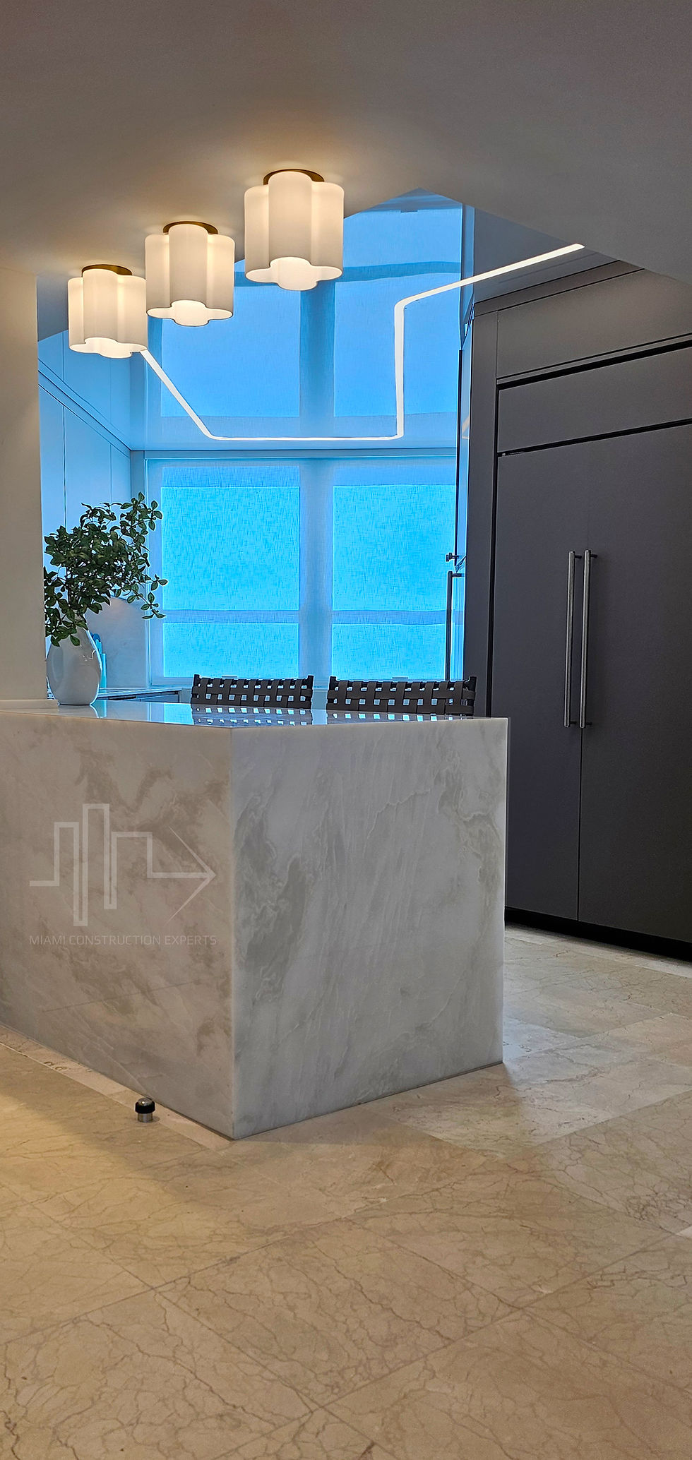 Integration of high-end materials and innovative design solutions in kitchen remodeling projects.