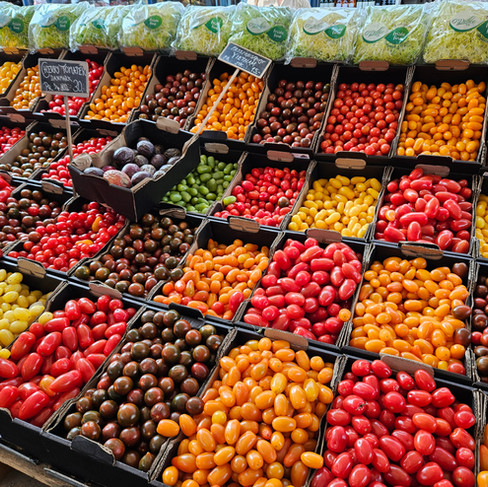 Fresh tomato stall at Torvehallerne KBH in Copenhagen Denmark. LisaEatsTheWorld.com