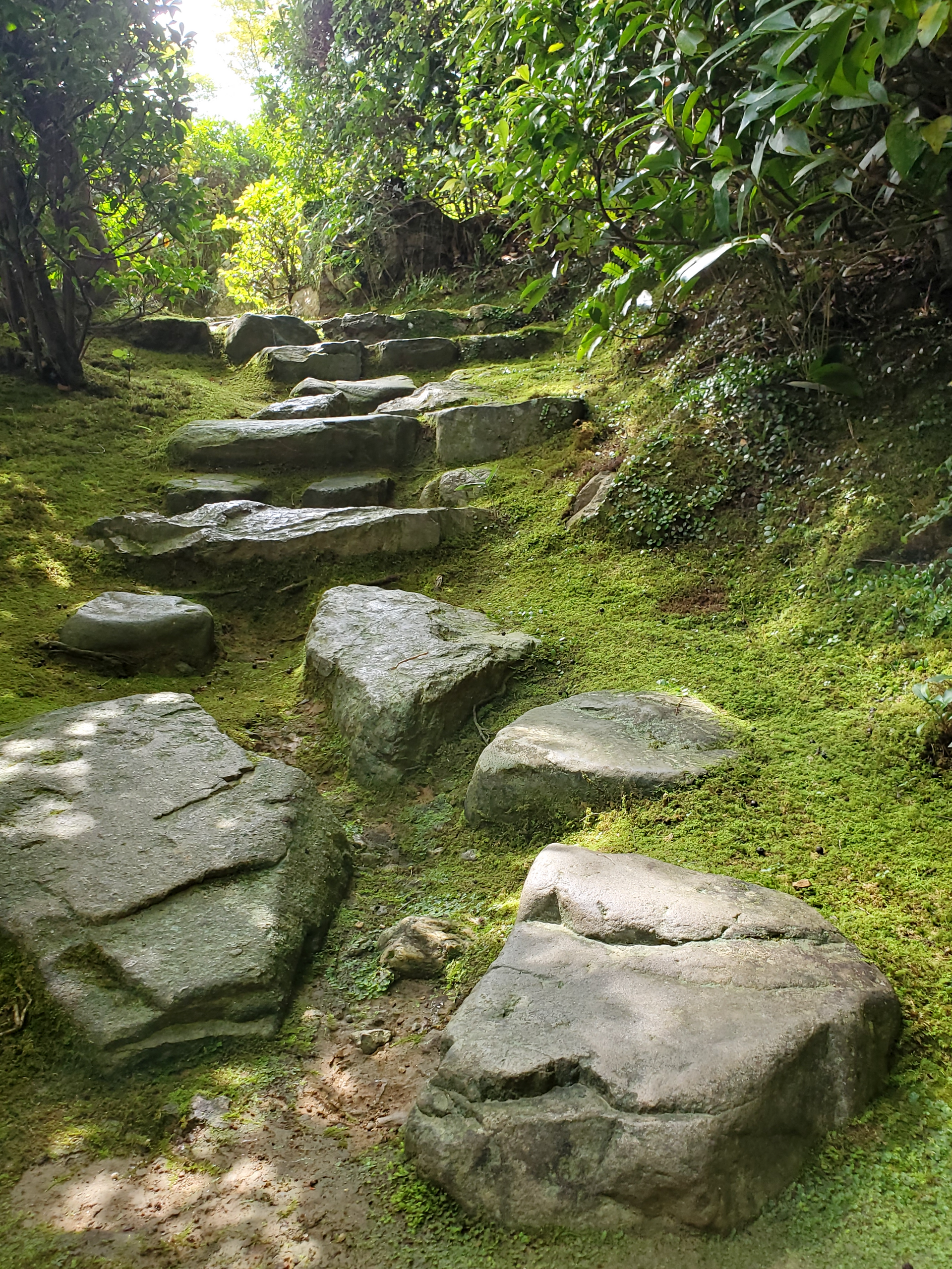 Showing height of stepping stones at Okochi Sanso Garden, Arashiyama, Kyoto Japan