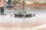 Close up pressure washing brick drive way.jpg