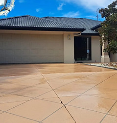 clean driveway of modern suburb house in Cleveland after pressure washing