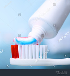 stock-photo-toothpaste-squeezed-from-tube-onto-brush-close-up-640968886.jpg