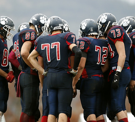 Football Player Huddle