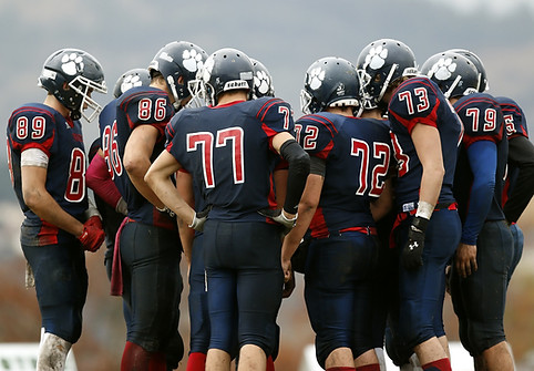 Football Player Huddle