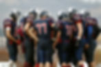 Football Player Huddle