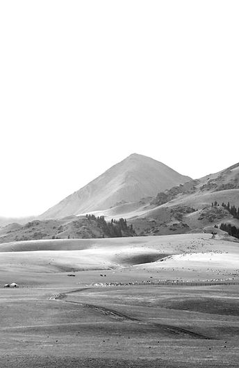 Pastures at the foot of a mountain_edited.jpg