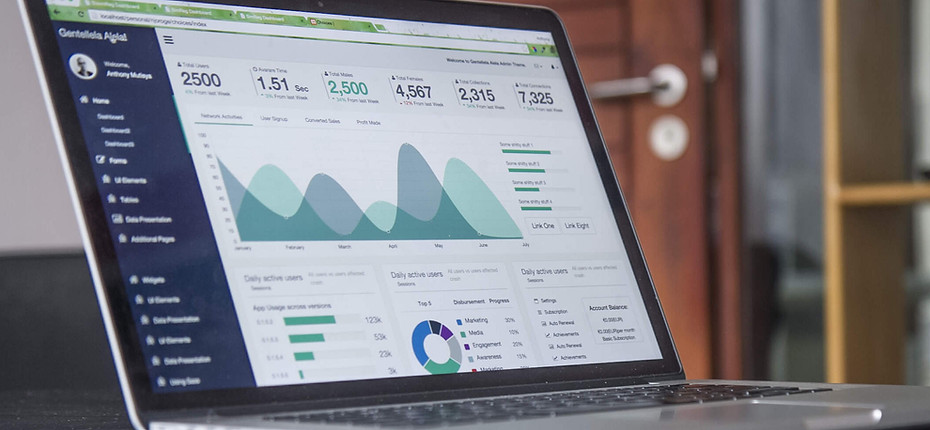 Computer with Blue and Green Graph