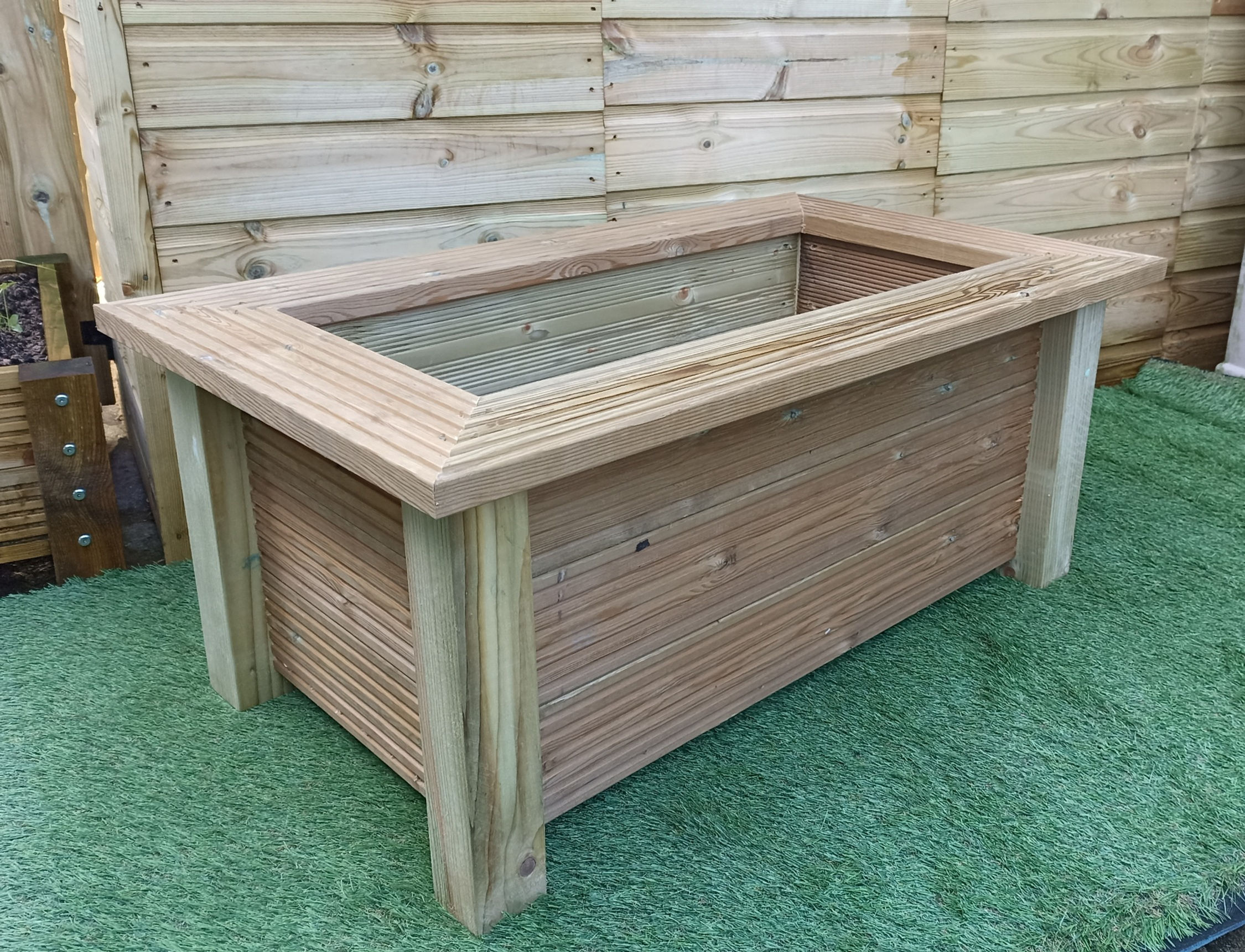 Rectangular garden planter with built in seat